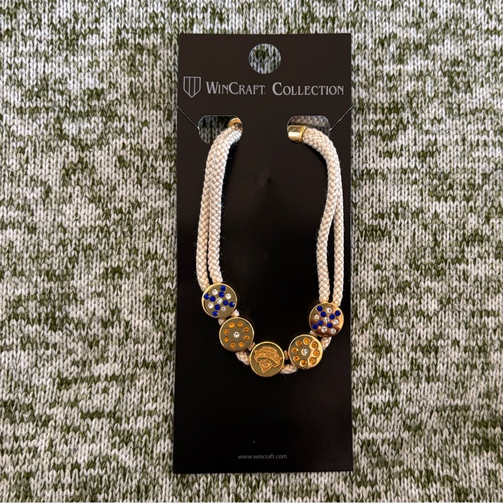 New York Knicks. Gold bracelet from Wincraft. New with tags. NBA.